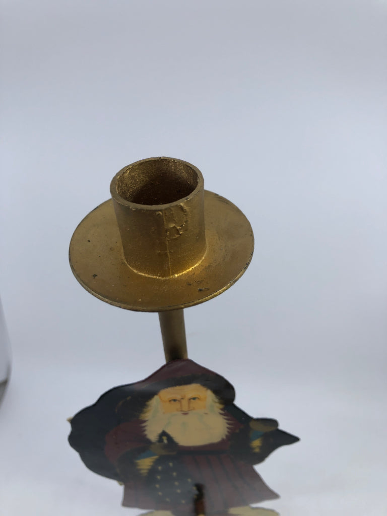 METAL SANTA TAPER CANDLE STICK.