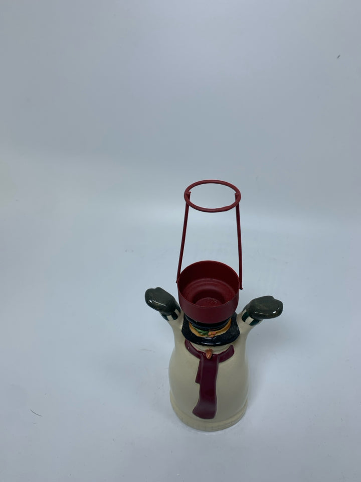 SNOWMAN HOLDING METAL HAT TEA LIGHT HOLDER.