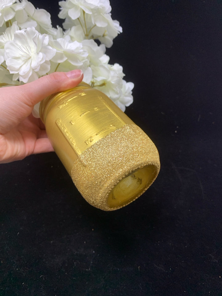 FAUX WHITE FLOWERS IN GOLD SPARKLE MASON JAR.