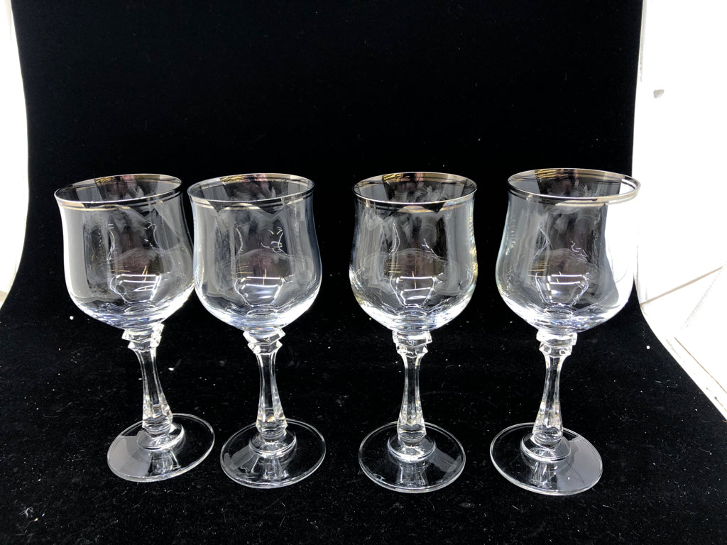 4 SILVER RIM WINE GLASSES.