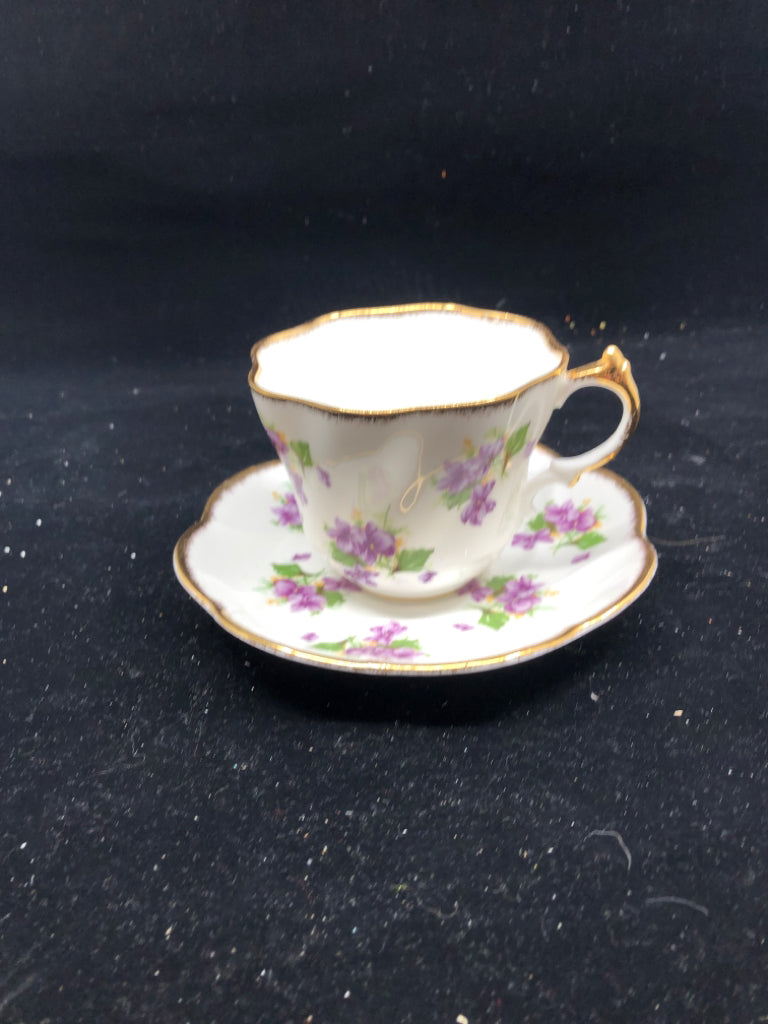 VTG PURPLE FLORAL TEA CUP AND SAUCER.