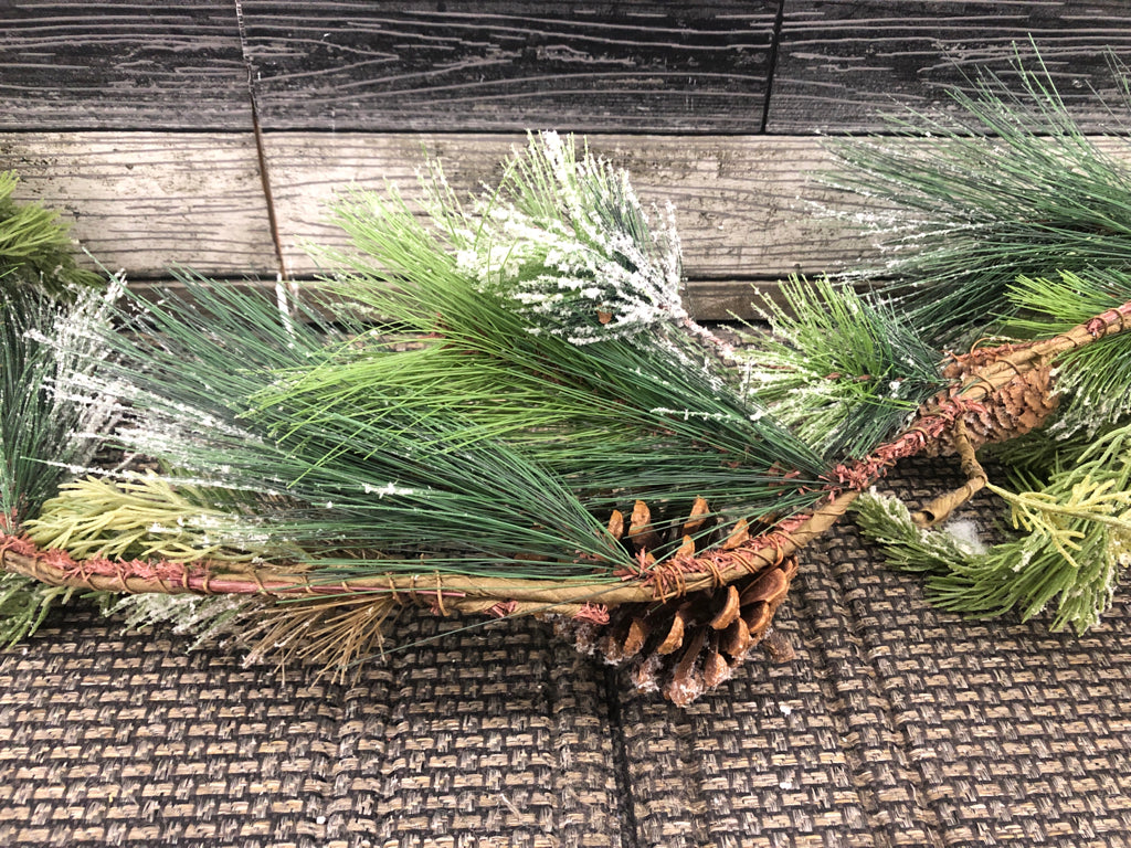 PINE NEEDLES W/ SNOW & PINE CONES GARLAND.