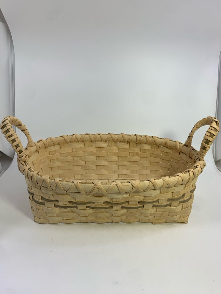BLONDE OVAL WOVEN BASKET W HANDLES W/GRAY STRIPE.