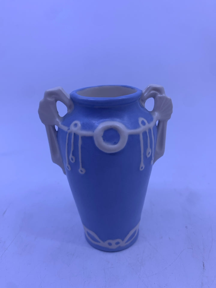 MINI LIGHT BLUE URN VASE W/ EMBOSSED WHITE DETAILS.