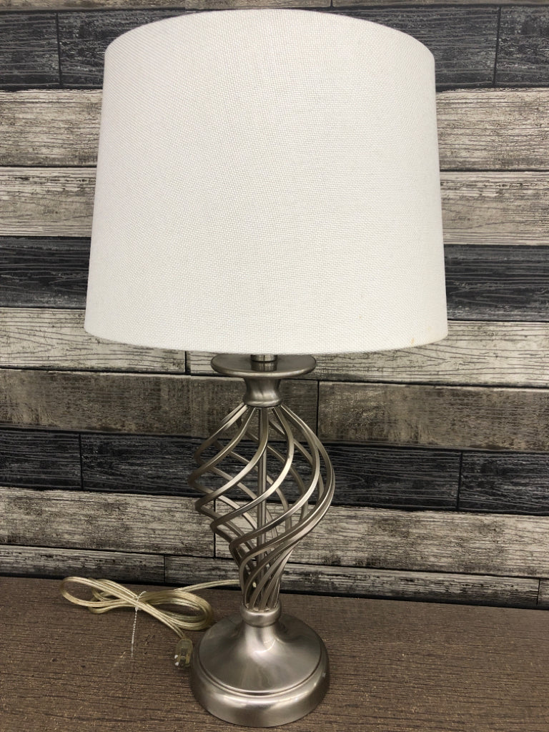 SILVER SWIRL LAMP W/CREAM SHADE.