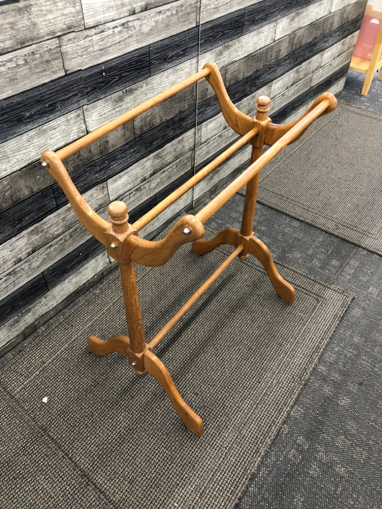 BLONDE WOOD BLANKET RACK.