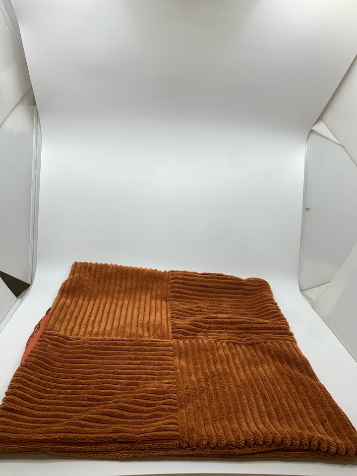 BROWN RIBBED PILLOW COVER.