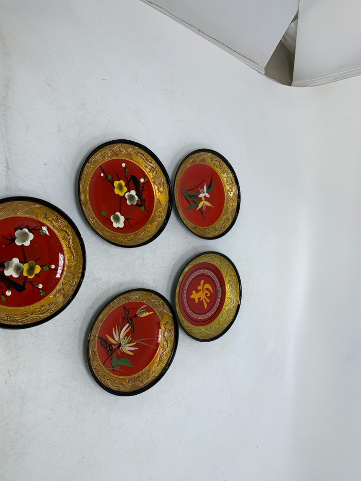 5 PLASTIC  RED/GOLD PAITNED SOY SAUCE BOWLS W/ FLOWERS.