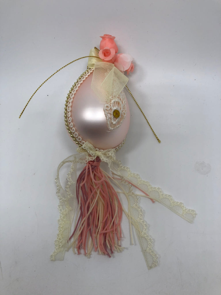 LACE PINK BULB ORNAMENT W/COLORFUL TASSELS.