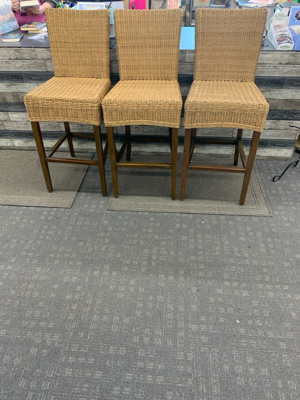 3 BROWN WICKER BAR STOOLS.