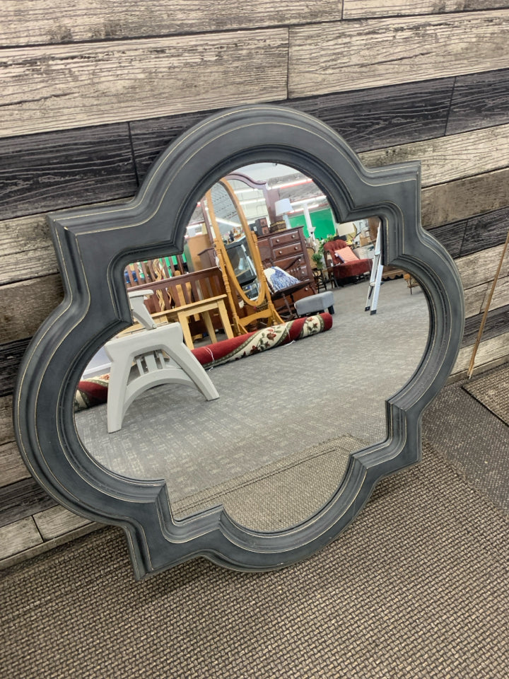 MIRROR W/BLACK DISTRESSED FRAME.