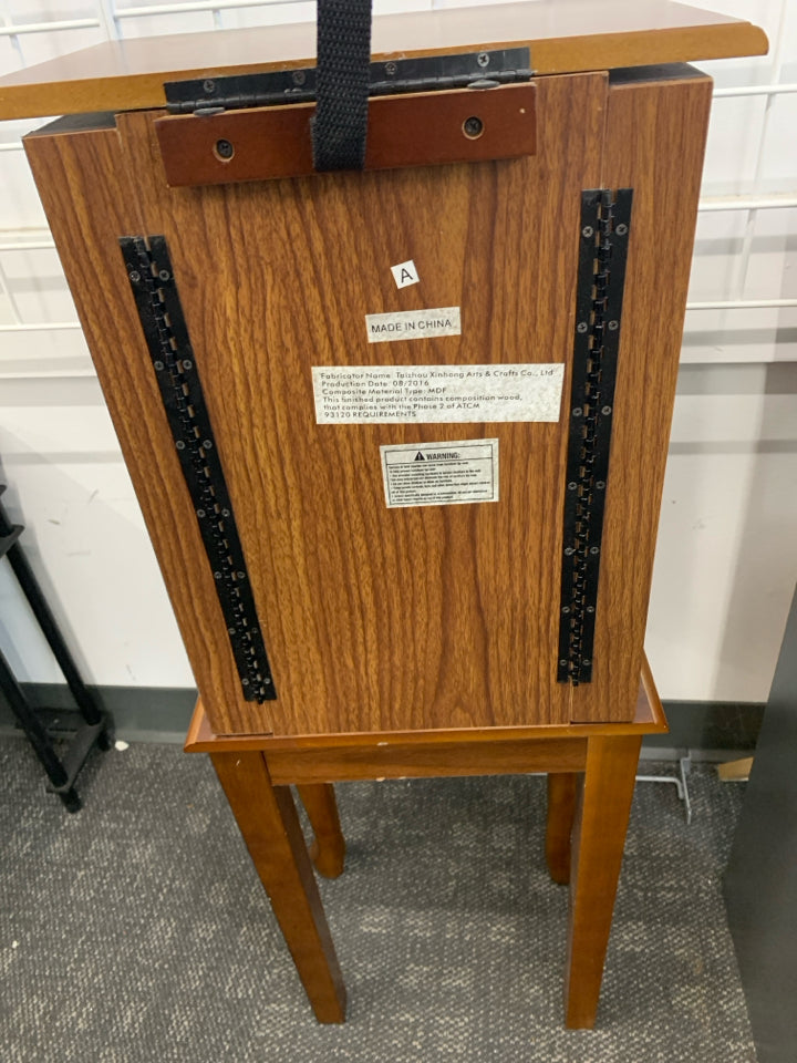 FAUX BROWN WOOD JEWELRY ARMOIRE.