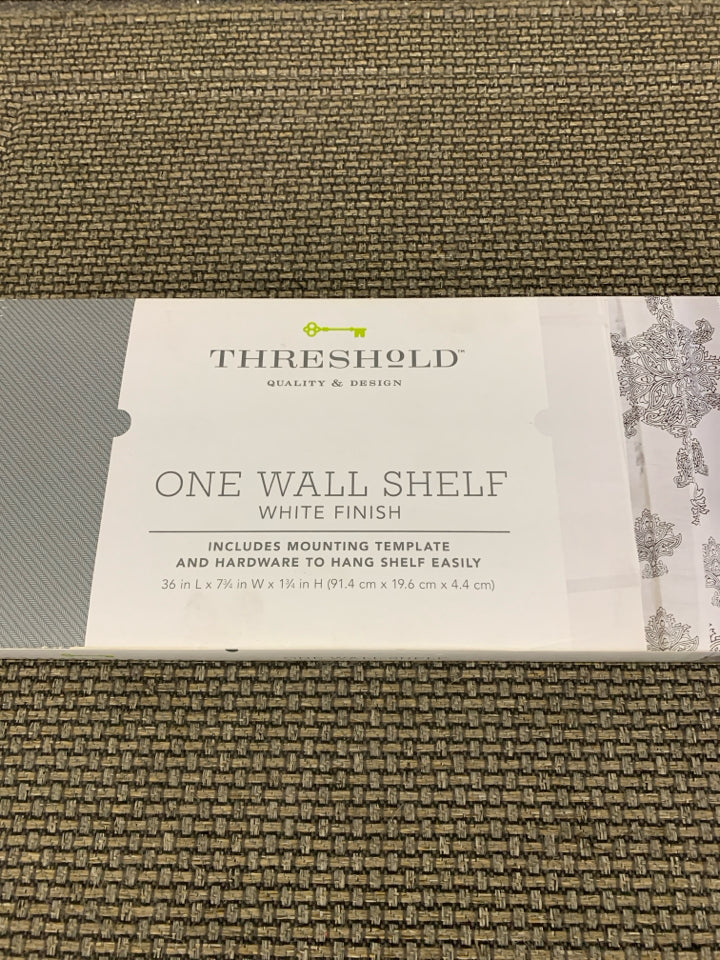 NIB WHITE FLOATING WALL SHELF.