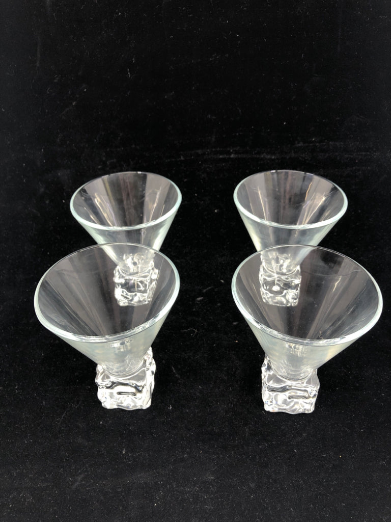 4 FLARED GLASSES W/ ICE CUBE SHAPED BOTTOM.