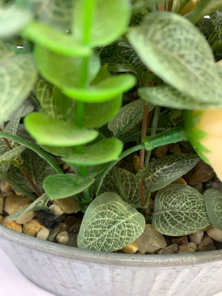 FAUX LEAVES & CREAM FLOWERS IN GALVANIZED TIN.