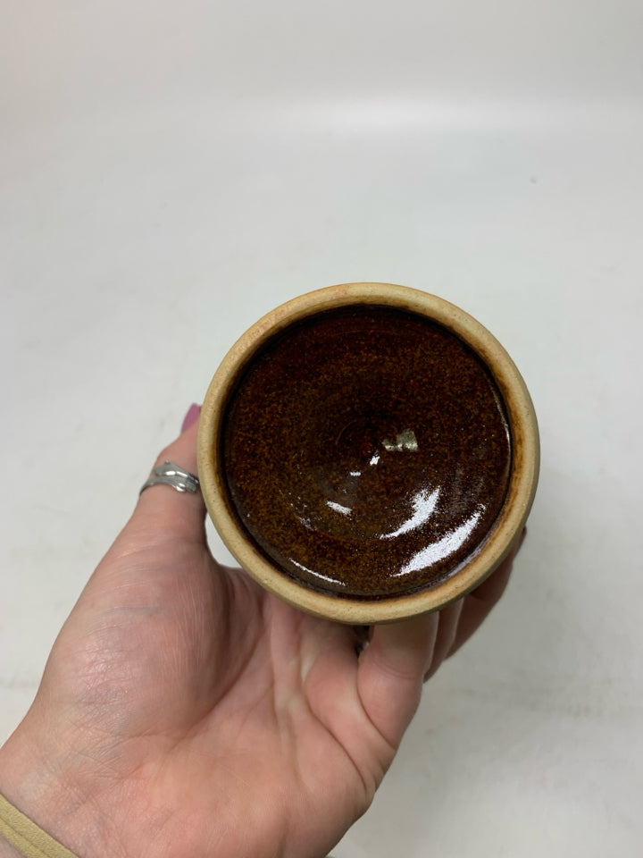 SHORT FOOTED POTTERY GOBLET W/ THE GORGONS HEAD MEDALLION IN CENTER.