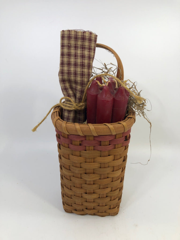 TALL BASKET W/ HANDLE, 6 RED CANDLES & NAPKIN.