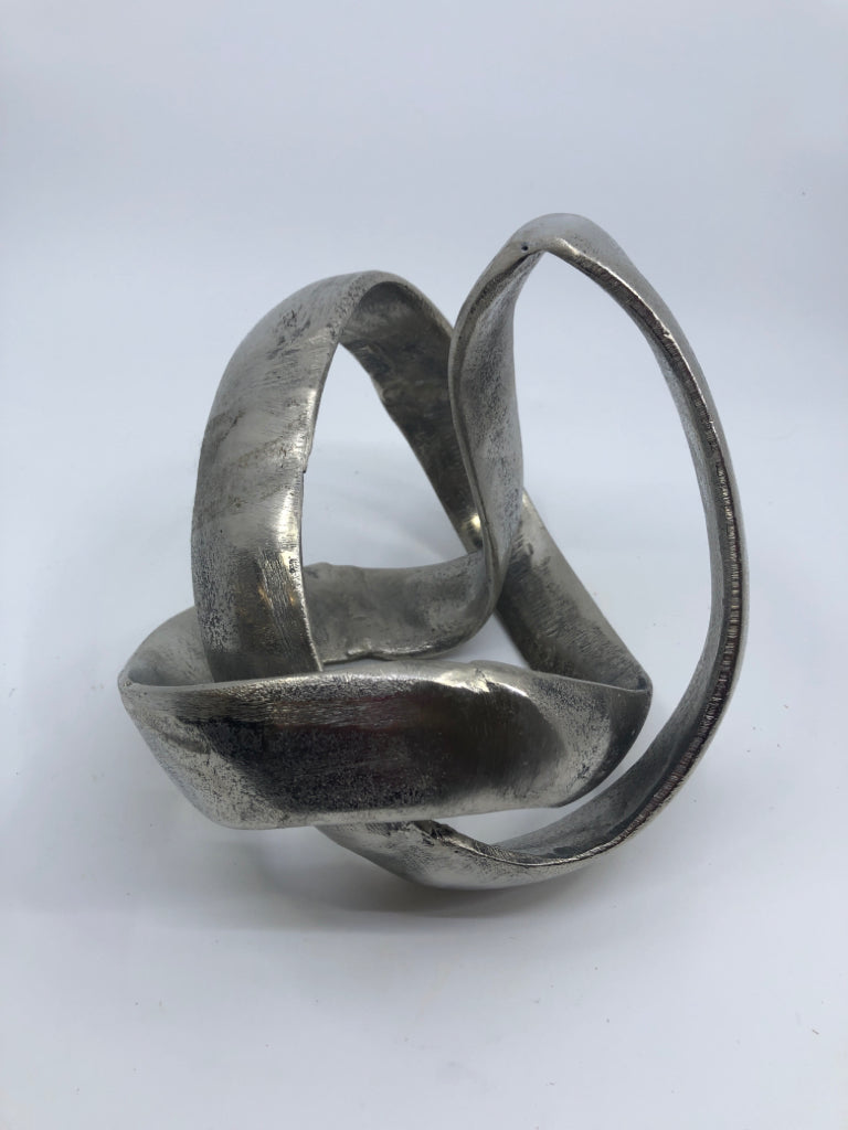 SILVER ABSTRACT DESK DECOR.