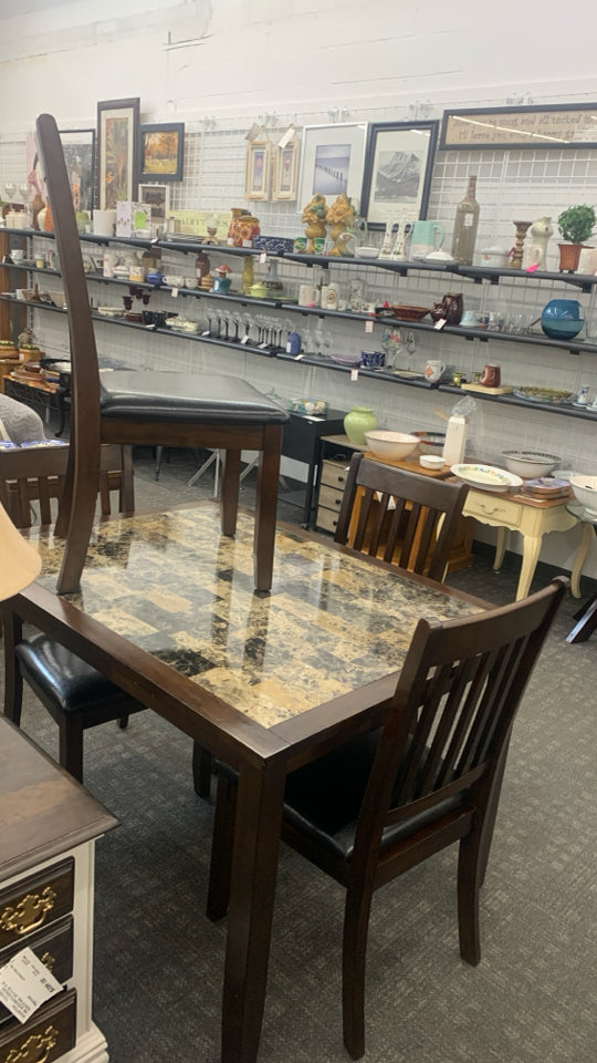 DARK WOOD DINING TABLE W/FAUX MARBLE TOP AND 4 DARK WOOD CHAIRS W/FAUX LEATHER S