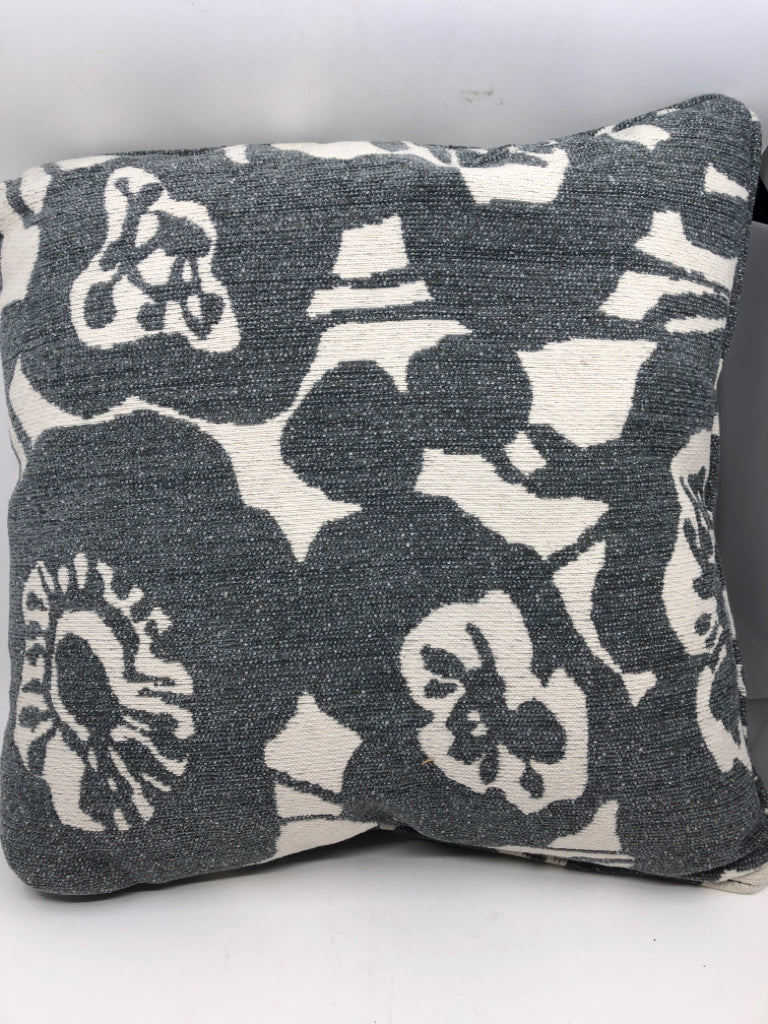 WHITE W/ BLUE/GRAY FLORAL PATTERN PILLOW.