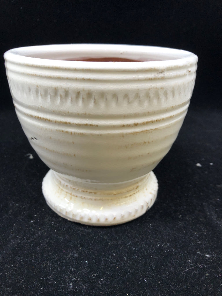DISTRESSED FOOTED WHITE PLANTER.