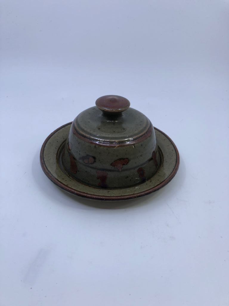 GREEN AND BROWN POTTERY BUTTER DOME.
