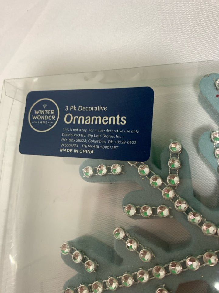 3 BLUE SNOWFLAKE ORNAMENTS.