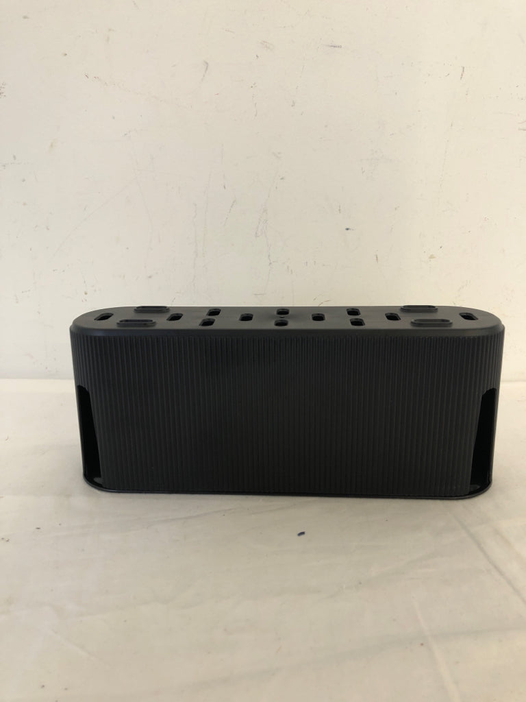 BLACK PLASTIC PLUG ORGANIZER.