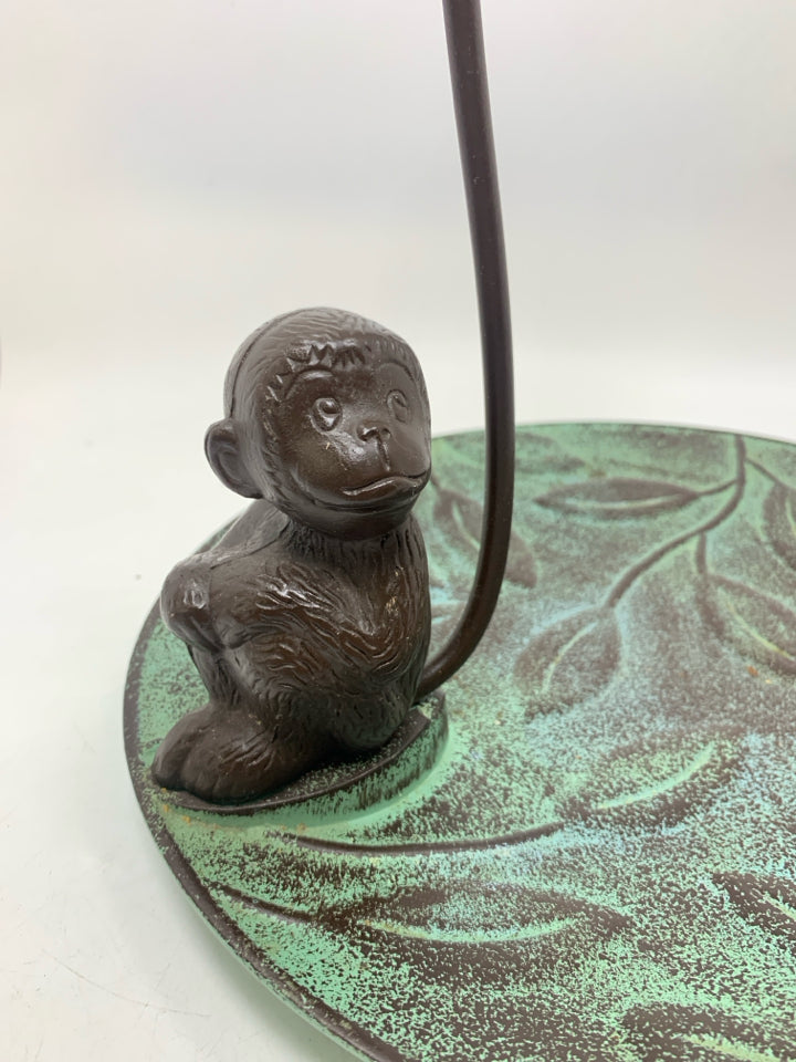 LARGE DISTRESSED LEAVE METAL BASE W/ MONKEY W/ LONG TAIL BANANA HOLDER.