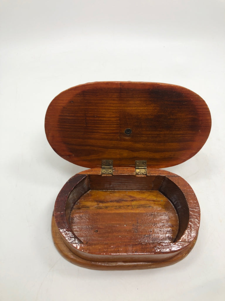 POLISHED WOODEN BOX WITH CAR ON TOP.