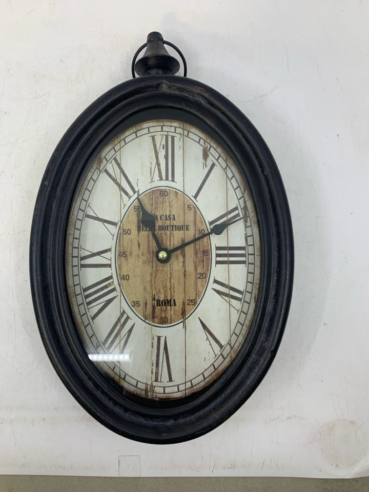 VINTAGE STYLE OVAL WALL CLOCK.