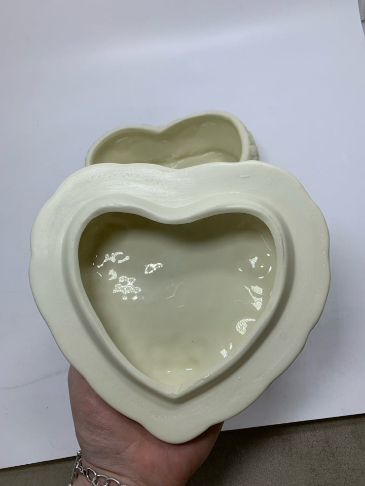 CERAMIC HEART SHAPED CANISTER W/ EMBOSSED ROSES & RIBBON.