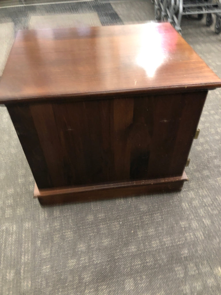 DARK WOOD SIDE TABLE WITH DRAWER/DOOR AND SHELVES.