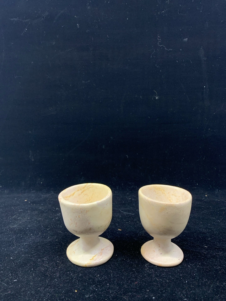 2 MARBLE EGG CUPS.