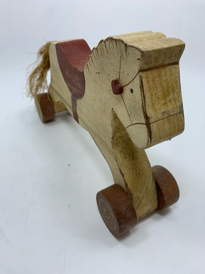 VTG WOODEN HORSE ON WHEELS.