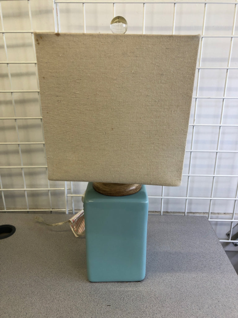 AQUA CERAMIC SQUARE BASE W/ CREAM SHADE.