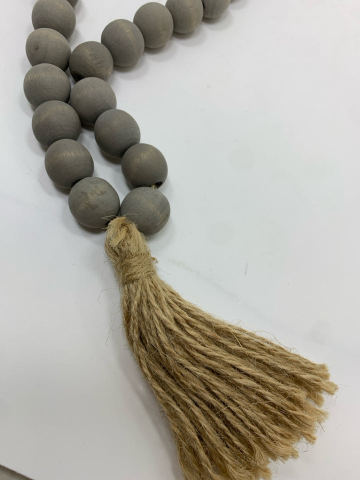GRAY WOOD BEADED GARLAND.