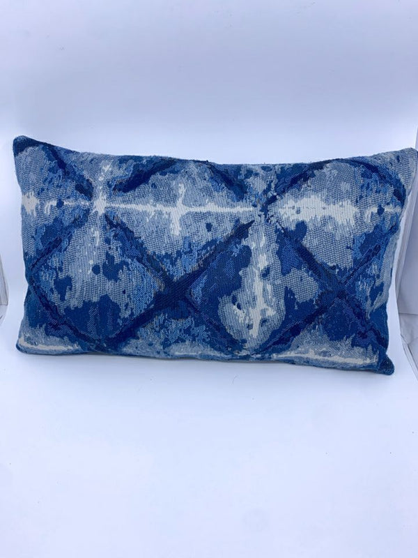 BLUE AND WHITE PATTERN RECTANGLE PILLOW.