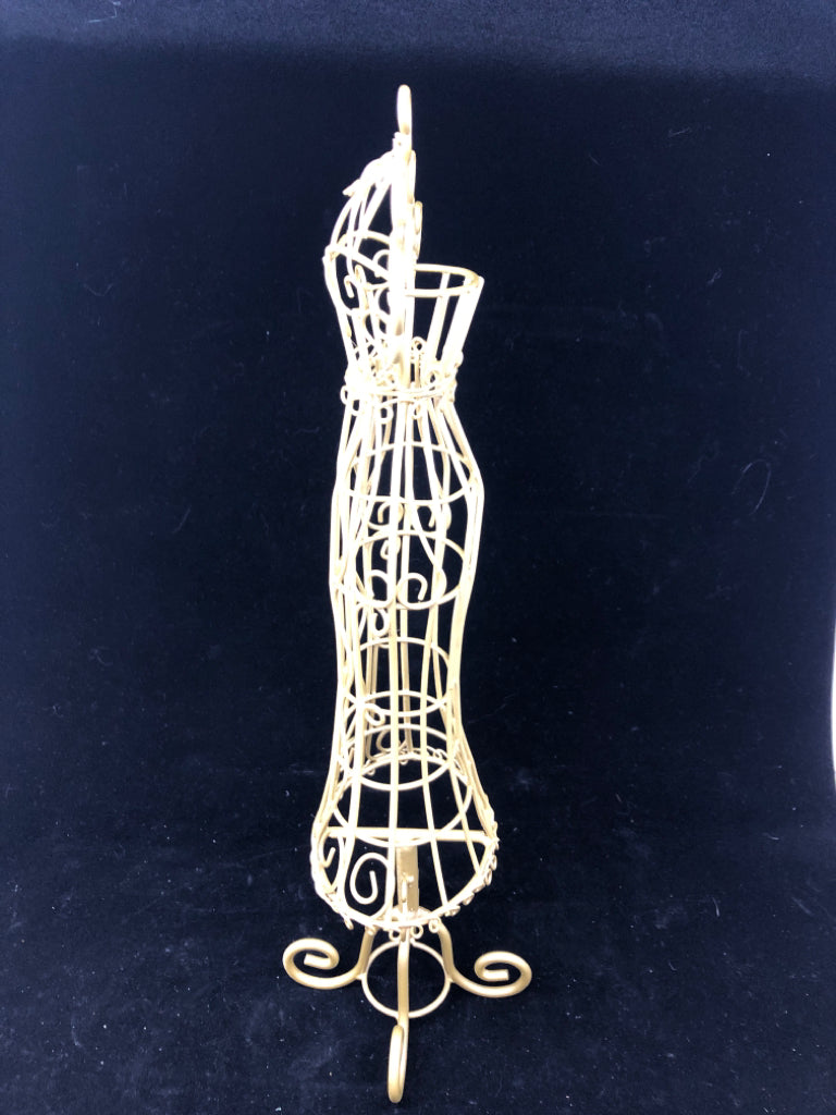 CREAM METAL DRESS SHAPED JEWELRY HOLDER.
