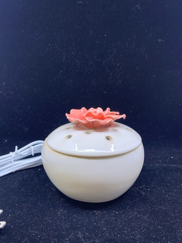 CREAM CIRCLE SCENTSY WAX WARMER W/ PINK FLORAL TOP.
