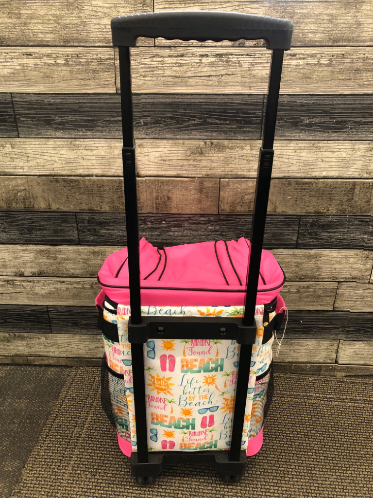 NEW ROLLING PINK COOLER W/HANDLE.