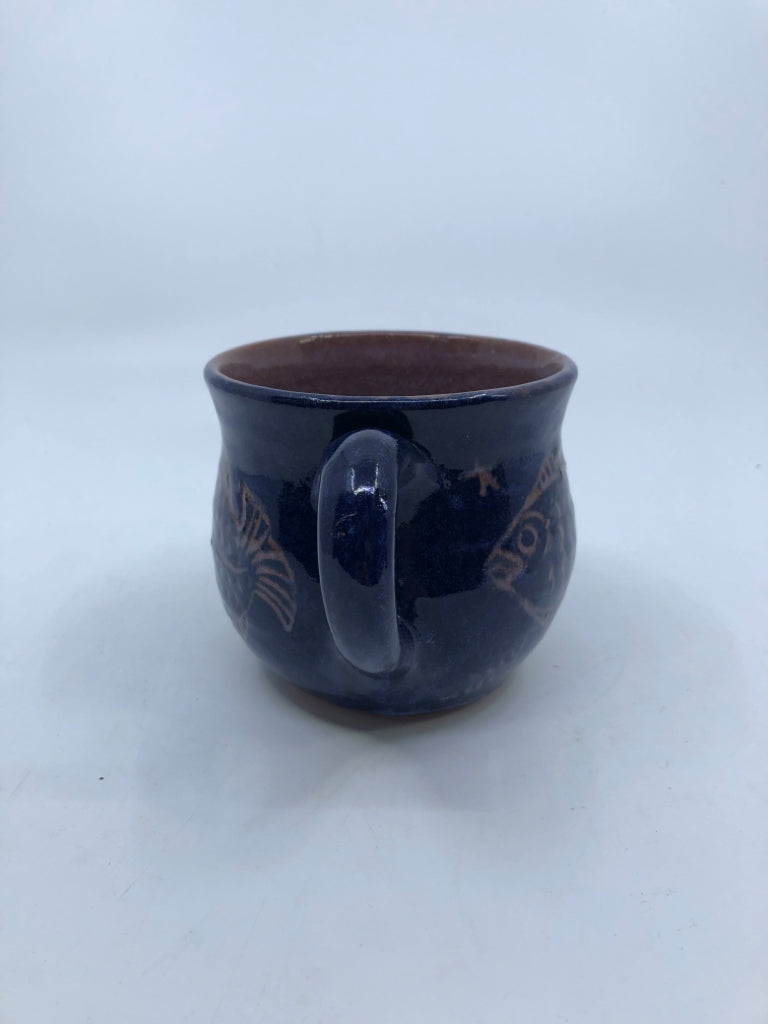 DARK BLUE POTTERY MUG W/ FISH.