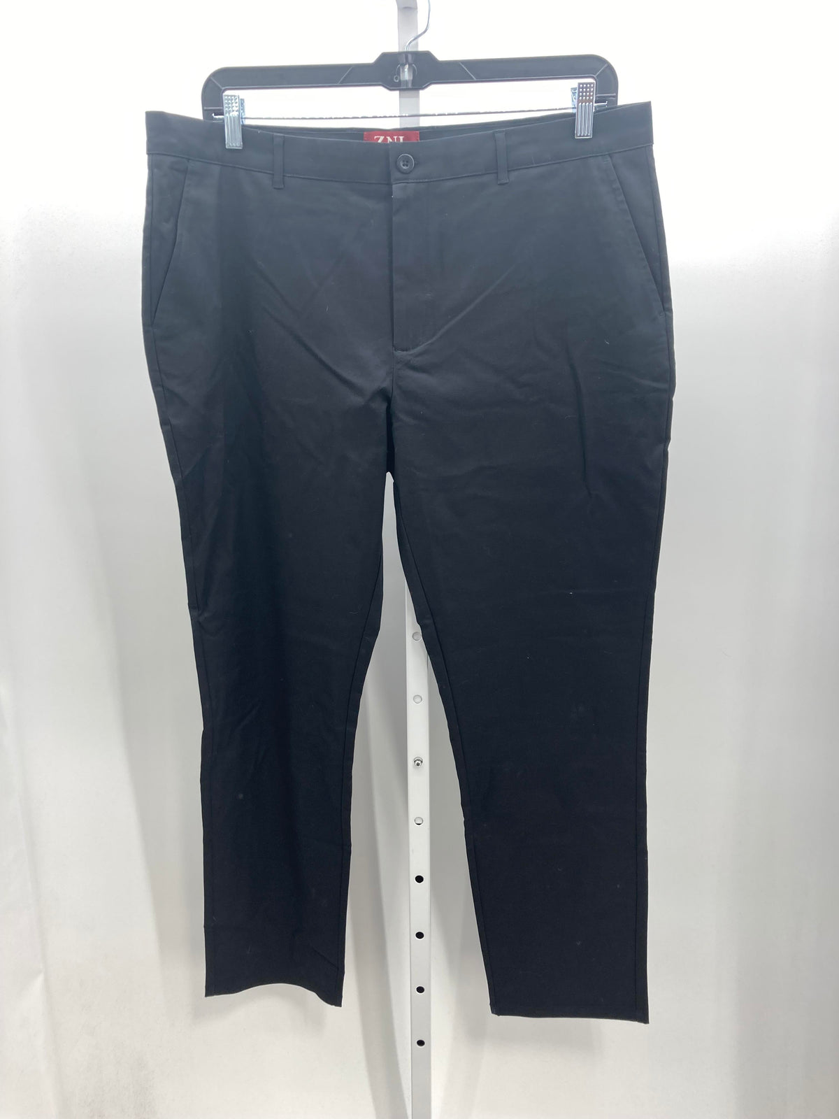 FLAT FRONT PANTS.