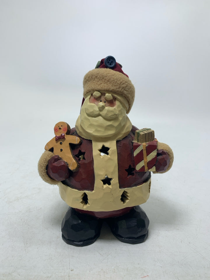 PRIMITIVE STYLE SANTA HOLDING PRESENT PIERCED TEA LIGHT HOLDER RESIN.