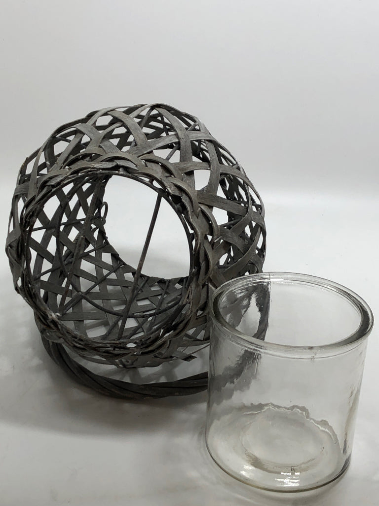 GRAY WOVEN CANDLE LANTERN.