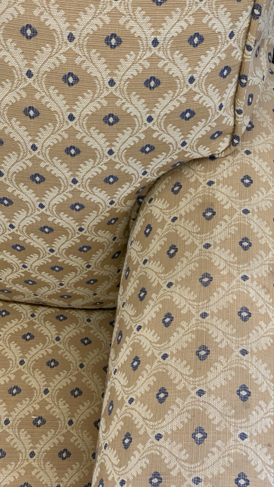GOLD WITH BLUE ACCENTS ARM CHAIR.