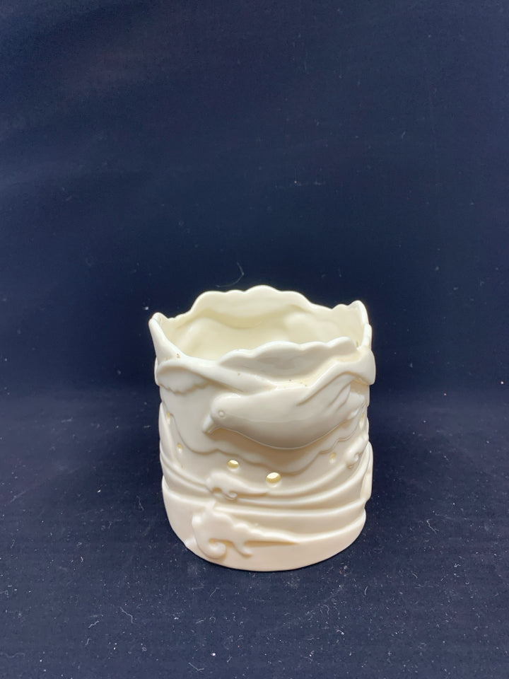 CREAM CERAMIC DOVE CANDLE HOLDER.