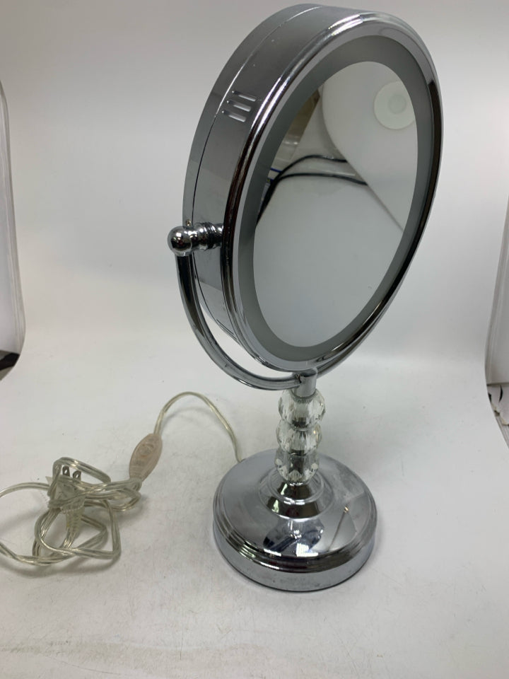 OVAL LIGHT UP VANITY MIRROR.