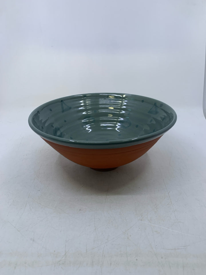 FOOTED TERRA COTTA SERVING BOW W/ BLUE GLAZED INSIDE W/ SHAPES.