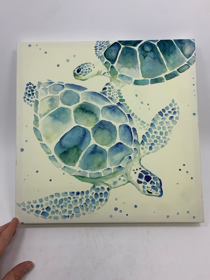 SWIMMING SEA-TURTLES CANVAS PRINT.